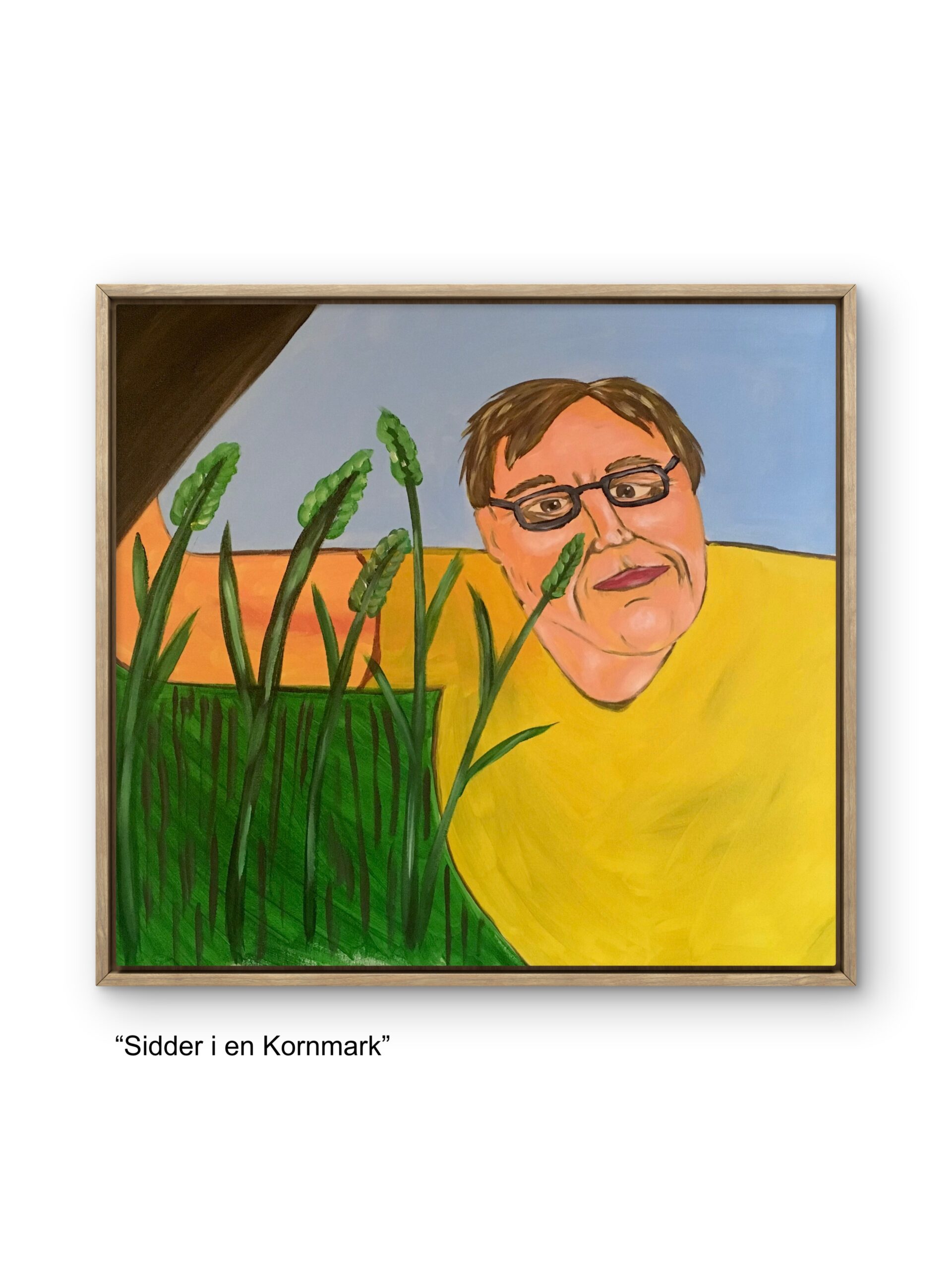 Sidder i en Kornmark